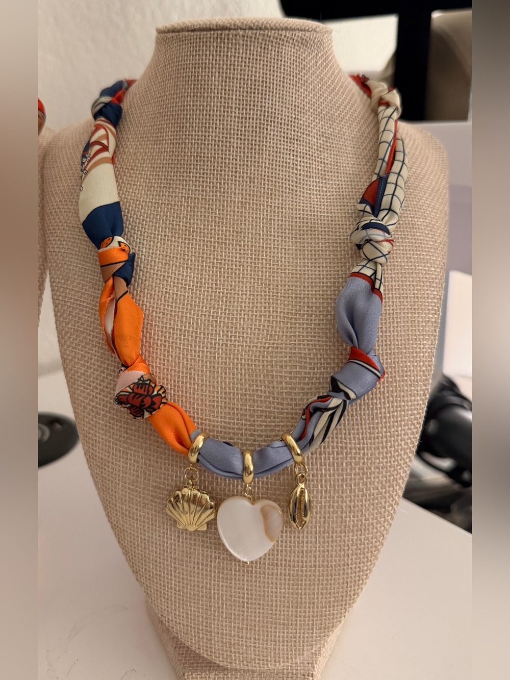 Scarf necklace with charms